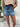 Denim skort “twist zip”