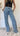 Broek met oranje streep